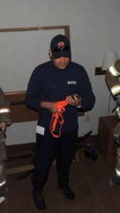 Lt. Patrick San Julian inspects rope equipment