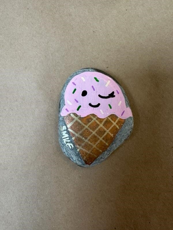 ice cream rock with winking face